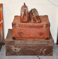 A Leather Travelling Trunk, a smaller canvas example and two leather Gladstone bags
