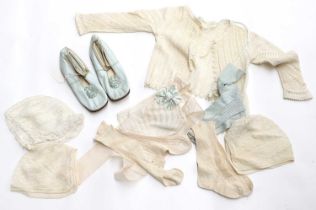 Early 20th Century Baby Costume Accessories, comprising a finely knitted baby bonnet with pale