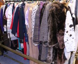 A Large Quantity of 20th Century Ladies Clothing comprising tweed snd faux fur coats, brown and