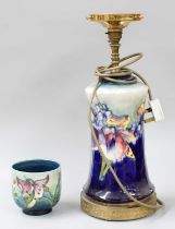 A Walter Moorcroft Table Lamp, Orchid and Spring Flowers pattern, of waisted cylindrical form and