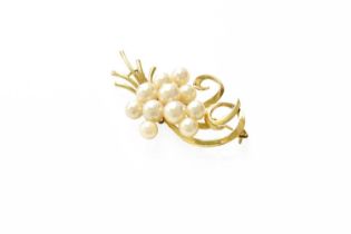 A Cultured Pearl Spray Brooch, by Mikimoto, measures 5.4cm by 3.3cm Stamped '14K' and in our opinion