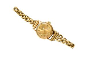 A Lady's 9 Carat Gold Tudor Royal Wristwatch, later 9 carat gold bracelet Gross Weight:- 15.1 grams