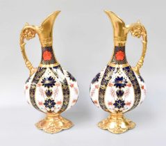A Pair of Royal Crown Derby Porcelain Ewers, decorated in Imari pattern 1128 (one 2nd quality)