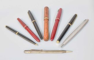 A Conway Stewart Fountain Pen, in orange marbled case, together with five Parker fountain pens,