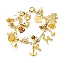 A 9 Carat Gold Fancy Link Bracelet, suspending twenty charms including an anchor, a boot, a barrel