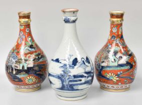 A Chinese Porcelain Gugglet, 19th century, painted un underglaze blue with a river landscape, 22cm