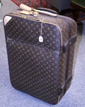 Louis Vuitton Pegase 65 Suitcase, in brown monogram canvas with zip fastening, telescopic handle,