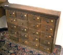 A Mahogany Bank of Twenty Numbered Small Drawers Provenance: Originally from The Royal Baths at