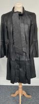 Diane Von Furstenberg Black Leather Coat with round neckline fastened with leather ties, a-line