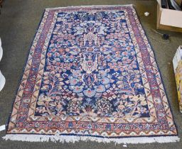 West Persian Village Rug, the indigo field of semi-naturalistic flowers around a medallion