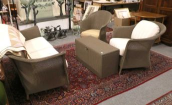 A Lloyd Loom Four Piece Grey Painted Wicker Conservetory Suite, comprising a sofa, two chairs and