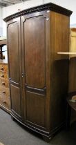 A Maple & Co. Mahogany Bow Fronted Wardrobe, 115cm by 60cm by 204cm