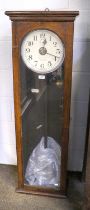 An Oak Cased National Time Recorder Electric Master Clock, 42cm by 22cm by 132cm