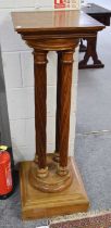 A Victorian Walnut Pedestal, the moulded square top on four twist-carved supports, on a stepped