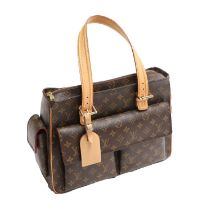 Louis Vuitton Monogram Multiply Cite Shoulder Bag comprising a double pocket to the front and