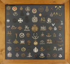 A Collection of Seventy Five British Military Badges, mainly pre-1953, including cap and collar