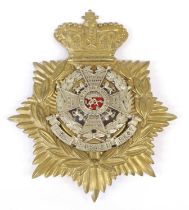 A Victorian Home Service Helmet Plate to the Border Regiment, with white metal badge backed by red