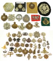 A Collection of Approximately Sixty Military Cap and Collar Badges, including Royal Malta Militia,