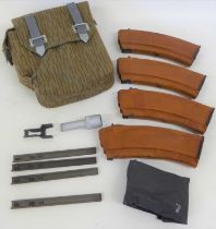 An East German MPi-AK-74N Rifle Magazine Set, comprising four bakelite magazines each with moulded