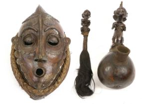 A Luba Figural Pipe, Democratic Republic of Congo, with gourd bowl and wood stem carved as a