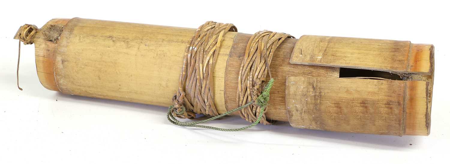 An Indonesian Sumpitan (Blowpipe), the bored-out wood haft set with a spearhead bound with wicker, - Image 7 of 13