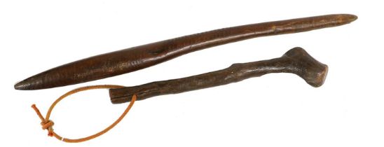 A 19th Century Australian Aboriginal Waddy, of elongated ovoid form in rich brown hardwood,
