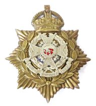 An Edwardian Home Service Helmet Plate to the Border Regiment, with white metal badge backed by