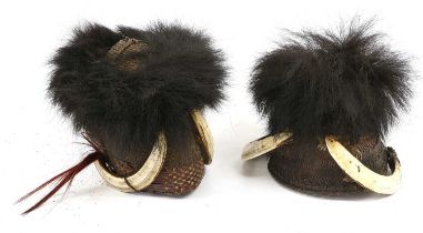 Two Abor Basket Weave Helmets, Naga, Assam, each of conical form, trimmed with black animal fur (