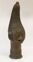 A Mid-20th Century Benin Bronze Bust of Queen Mother Idia, Nigeria, with high conical coiffure