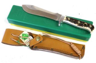 A Puma White Hunter Knife, the 15.5cm steel blade numbered 11 6375, and with reinforced tip, with