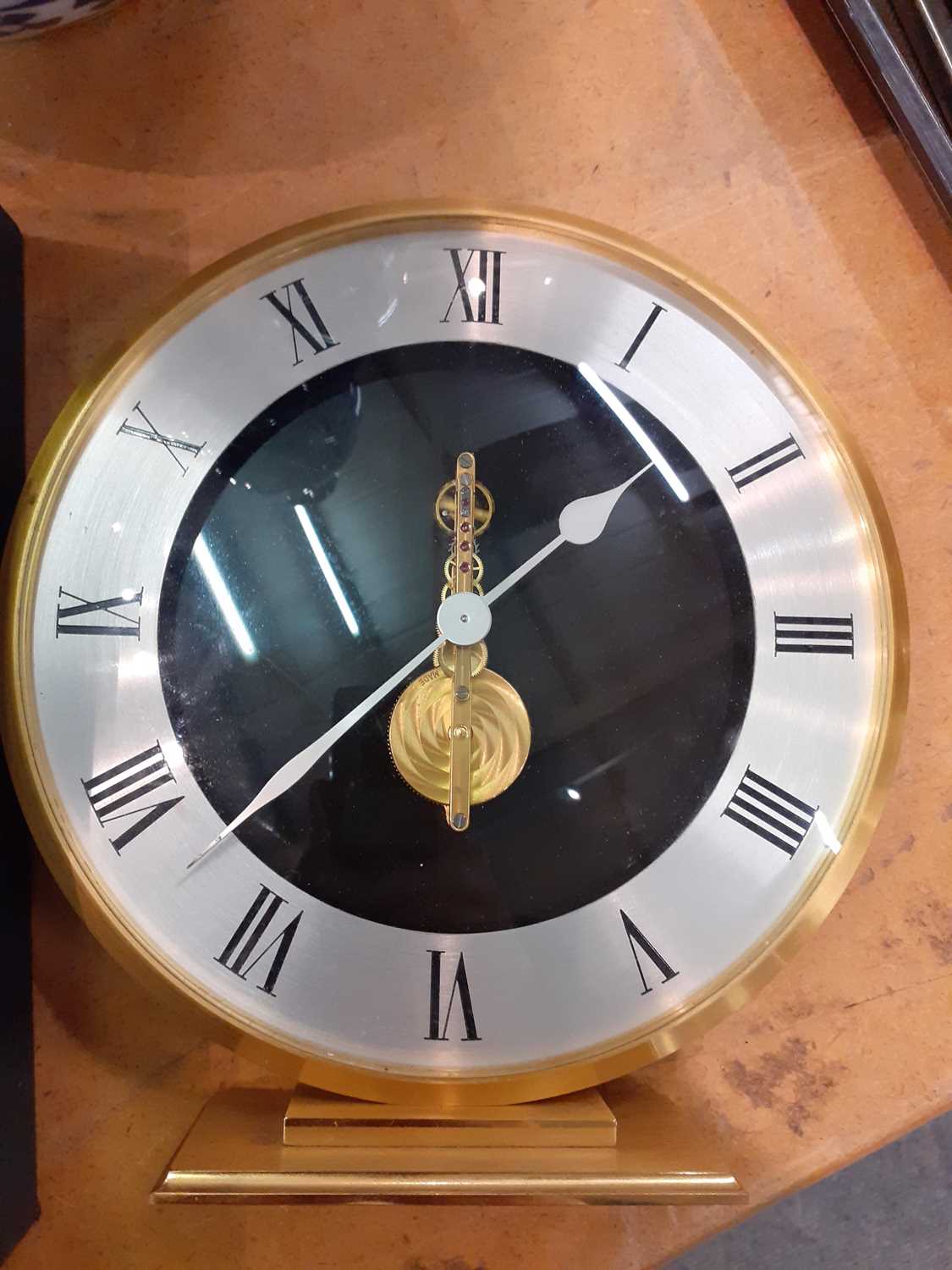 A Cased Jaeger le Coultre, circular mantel clock Case with some small scratches, case discoloured in - Image 6 of 7