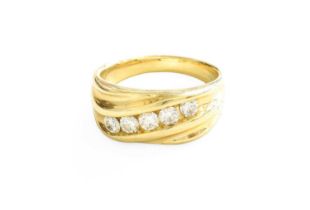 A Diamond Five Stone Ring, the round brilliant cut diamonds arranged diagonally in yellow tension