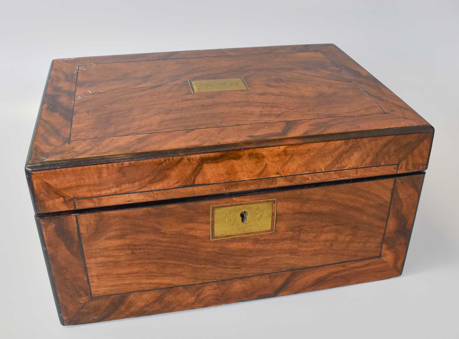 A Victorian Walnut Writing Slope, Edwardian mahogany inlaid mantel timepiece, circa 1900, and a - Image 2 of 4