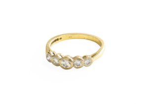 An 18 Carat Gold Diamond Five Stone Ring, the graduated round brilliant cut diamonds, in white