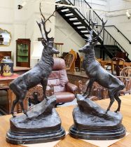 After Jules Moigniez (1835-1894) French, a pair of reproduction patinated bronzed metal sculptures