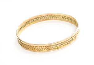 A 9 Carat Gold Bangle, inner measurement 6.5cm diameter Gross weight 21.8 grams.