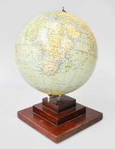 A Philips' British Empire Globe, by George Philip & Son Ltd, 32 Fleet Street, raised upon a