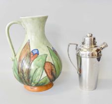 A Plated Cocktail Shaker and Cranston Pottery Jug (2)