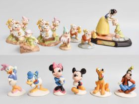 Royal Doulton Disney's "Snow White and the Seven Dwarfs" Figures, including: 'Dopey's First Kiss',