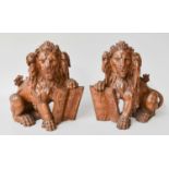 A Pair of Late 18th Century/ Early 19th Century Carved Lions, 25cm high One example lacking tail.