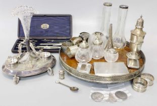 Silver including, cigarette cases, caster, match striker, napkin rings, two Victorian Crowns etc a