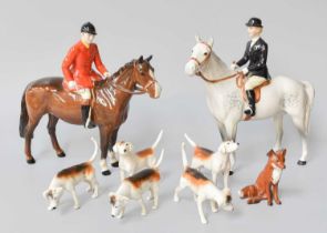 Beswick Hunting Group; comprising: Huntswoman, on grey, Huntsman, on brown; a seated fox and five