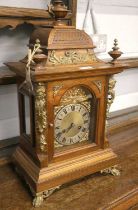 A German Quarter Striking Junghans Table Clock, circa 1900, 54cm high Case faded in parts, top urn