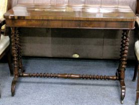 A 19th Century Rosewood Side Table, on turned supports, 98cm by 50cm by 70cm