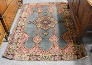 Unusual Anatolian Rug, the pale indigo field with central diamond medallion enclosed by cartouche