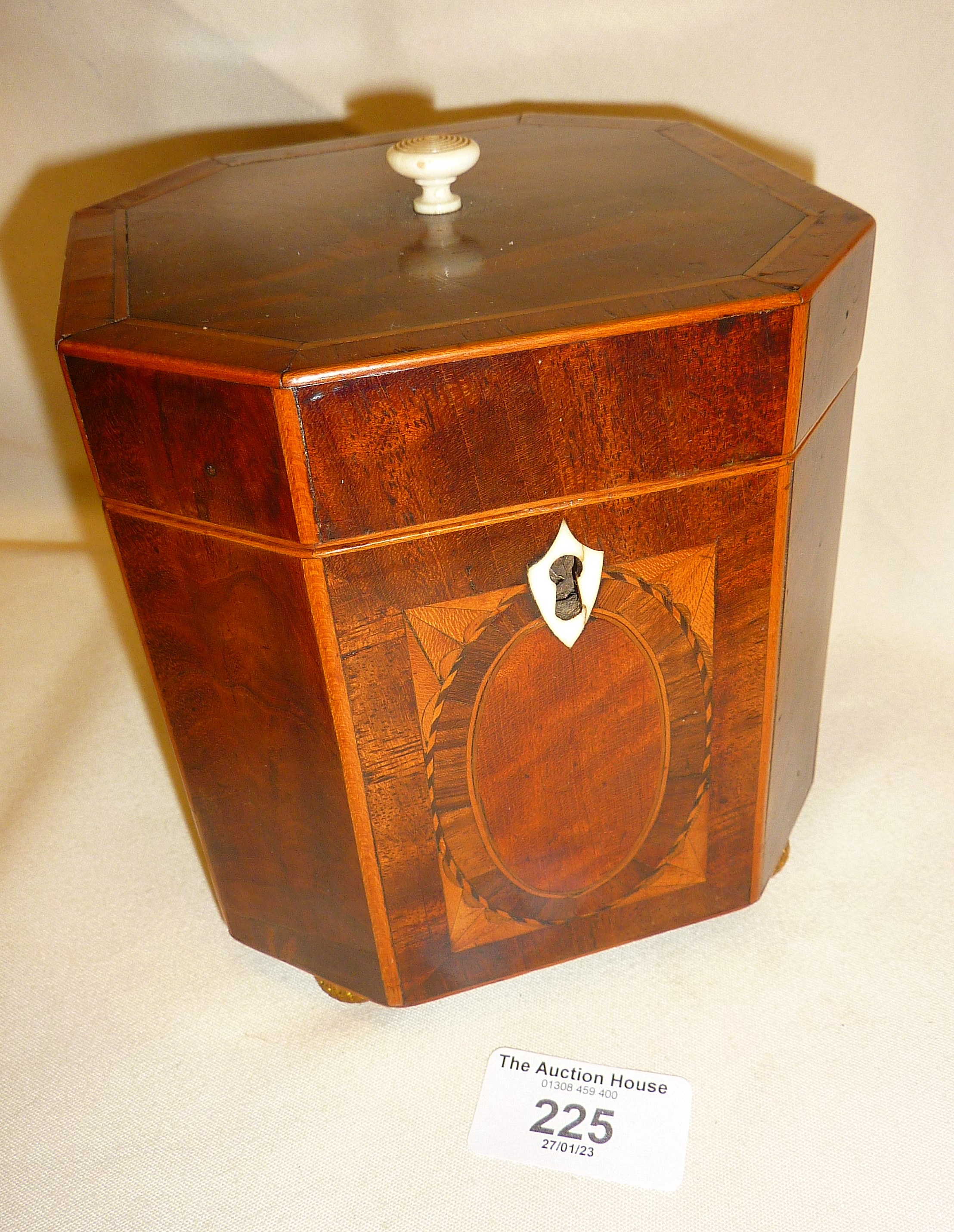 Georgian octagonal mahogany tea caddy with fine panels inlaid with satinwood and rosewood,