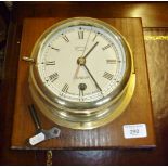 A pre-war brass Royal Navy ship's clock from HMS Bridport