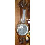 Carved oak banjo barometer