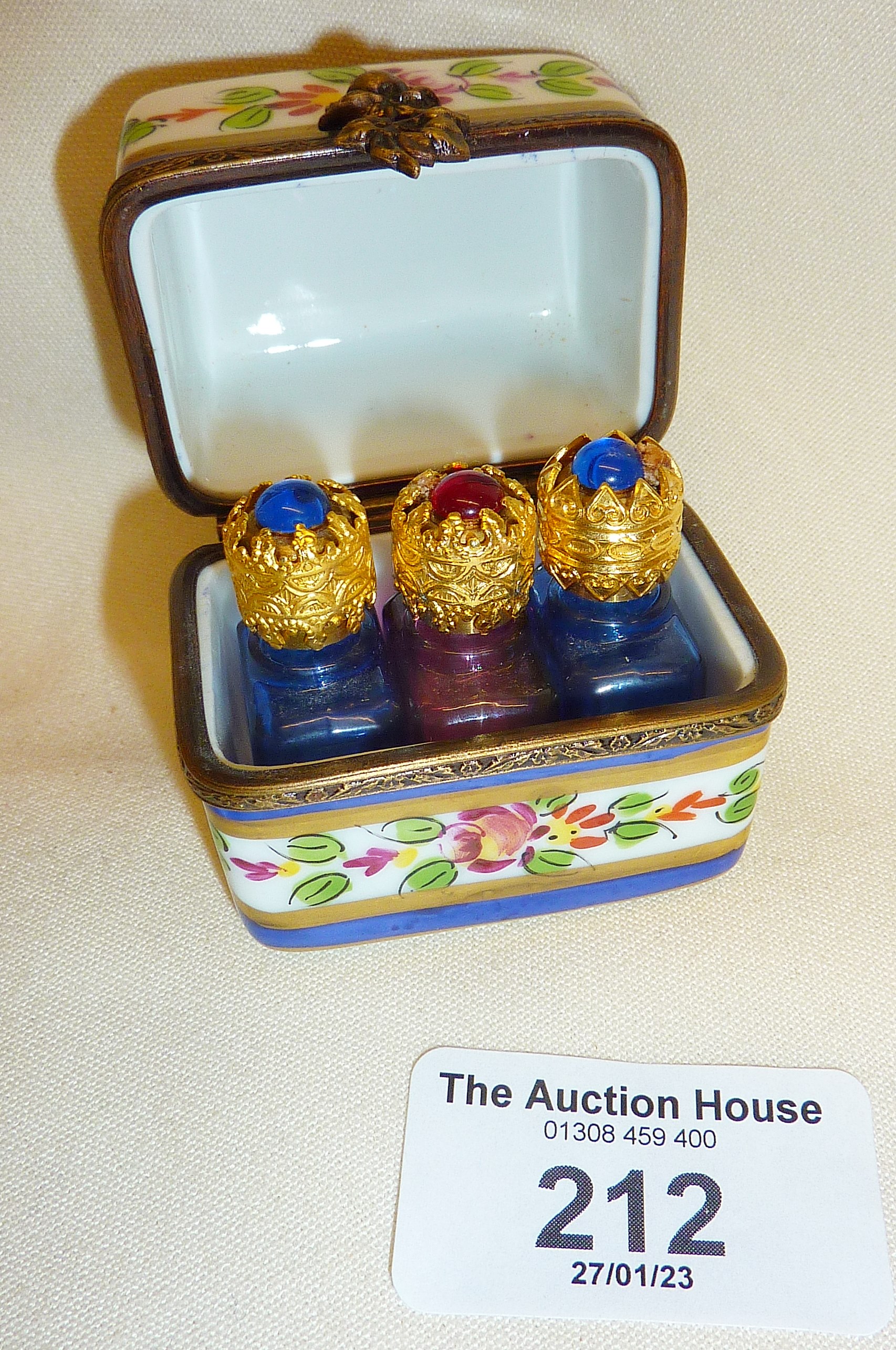 Limoges perfume casket containing three miniature scent bottles, box approx. 5cm high