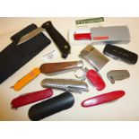 Various pen and pocket knives including Victorinox and a wooden handled WITNESS